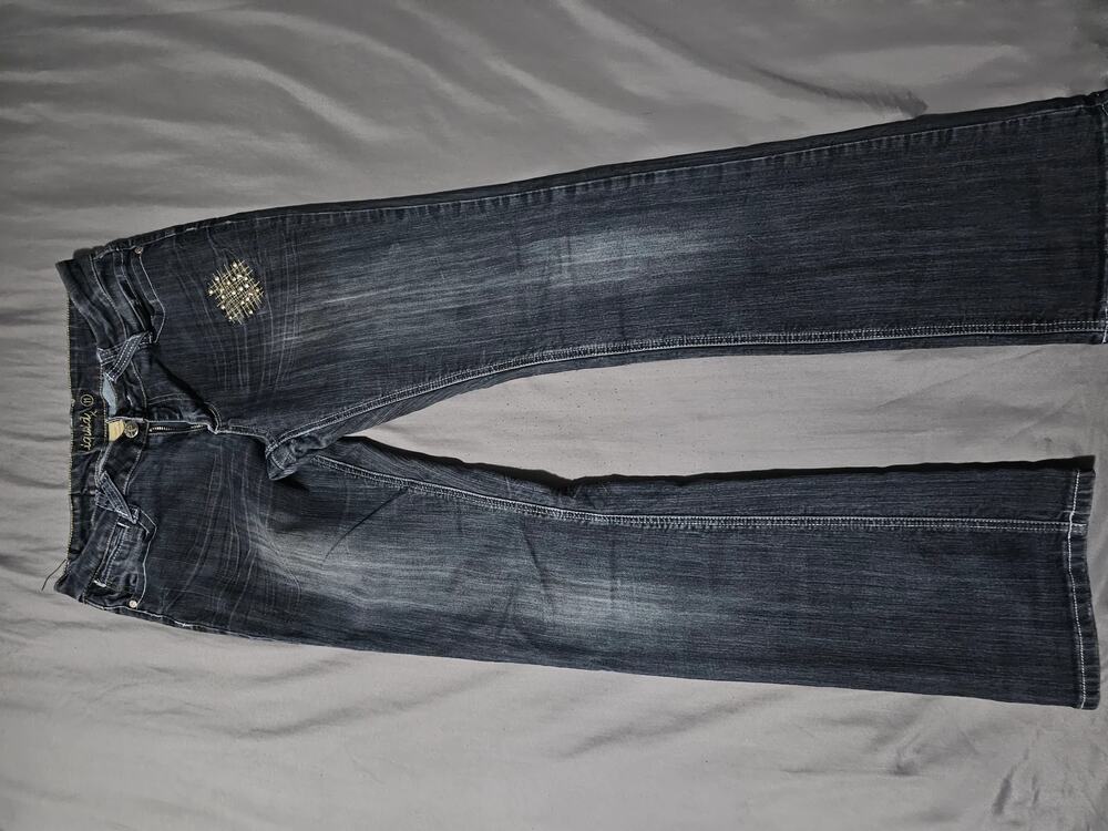 Dark wash denim jeans contrast stitching faded whiskering embellished back pocke